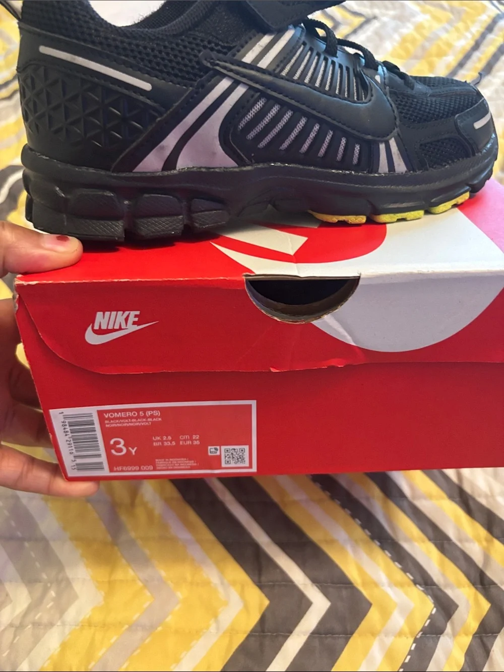 Nike kid’s Black and White Athletic Sneakers with Neon Yellow Accents